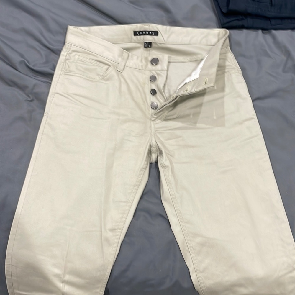 Khaki Theory pants.